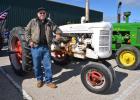 Verde Pepin of Motley is pictured with his 1950 Farmall C demonstrator tractor that he drove across the five-mile long Mackinac Bridge in Michigan this past September. (Photo by Jennifer Kiel, Michigan Farmer/Farm Progress editor)