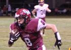 Mason Nyhus evades Pillager defenders to earn extra yards after catching a pass. (Staples World photo by Mark Anderson)