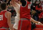 Josiah Burton blocks a shot in a game earlier this season. 