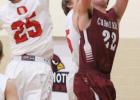 Jack Fietek gets the ball past two taller Osakis defenders for a basket. (Staples World photo by Mark Anderson)