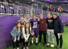 Friends and high school teammates of Cade Schmidt met him on the field of U.S. Bank Stadium after the experience of the Minnesota Football Showcase. (Submitted photos)