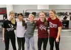 The first team of Staples-Motley girls wrestlers completed their season at the section meet on Feb. 9. At a practice before the tournament, five girls wrestlers paused for a photo, from left, Leah Greenwaldt, Kana Reese, Mikayla Pesta, Isabelle Dobson and Charlotte Wunderlich. Not pictured, Mia Pesta and Kyleena Rudlang. (Staples World photo by Mark Anderson)