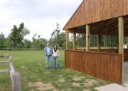 Wadena County Parks Maintenance Supervisor Glenn Motzko and Parks Adminstrator Deana Malone check out the new pavilion at Old Wadena, which was rebuilt after being flattened by a tornado in 2022, right. (Staples World phtotos by Mark Anderson)
