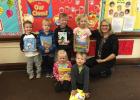 A number of area children received free books recently, thanks to the Reading for the Future program sponsored by Freshwater Education District. Lisa Wick, Early Childhood Coordinator for Freshwater Education District, is pictured above with pre-school students at Sacred Heart Area School (Parker, Bentley, Charlie, Kate, Finlay, Aro)