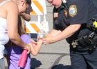 Staples Police Chief Melissa Birkholtz gave a child a choice of prizes given by the department for National Night Out. The second annual event, which was coordinated by the Staples Police Department, featured city and county law enforcement and emergency services. About 200-300 people attended.