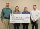Money back for saving energy Staples-Motley School District receives a rebate check for adding energy saving equipment to their recent construction project. From left, Staples City Administrator Jerel Nelsen, Staples-Motley Schools Superintendent Shane Tappe, Staples Public Works Director Scott Grabe and Joe Peters, Missouri River Energy field representative. The school also received a smaller rebate check for their elementary school renovation. (Staples World photo by Mark Anderson)