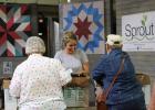 Community members come to pick up their food at the RxCSA/VetCSA program.
